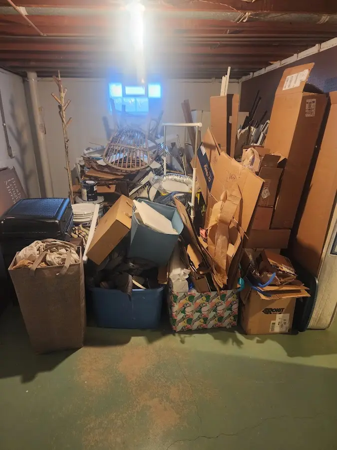 Roll-off dumpster container at job site for 4 Yard Dumpster Rental in Bangor Base